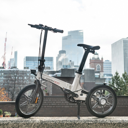 Axonrides E Bike in front of Cityscape